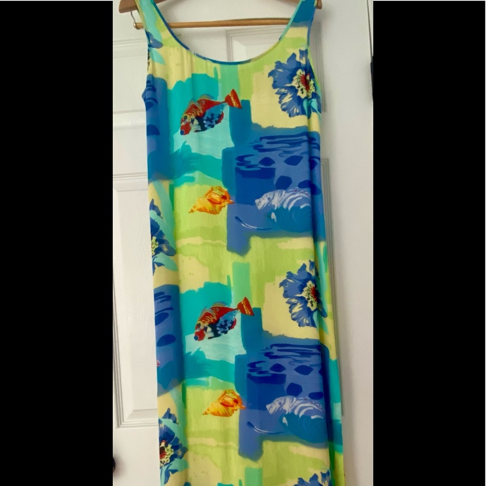 BEAUTIFUL RICKY’S COLORFUL DRESS